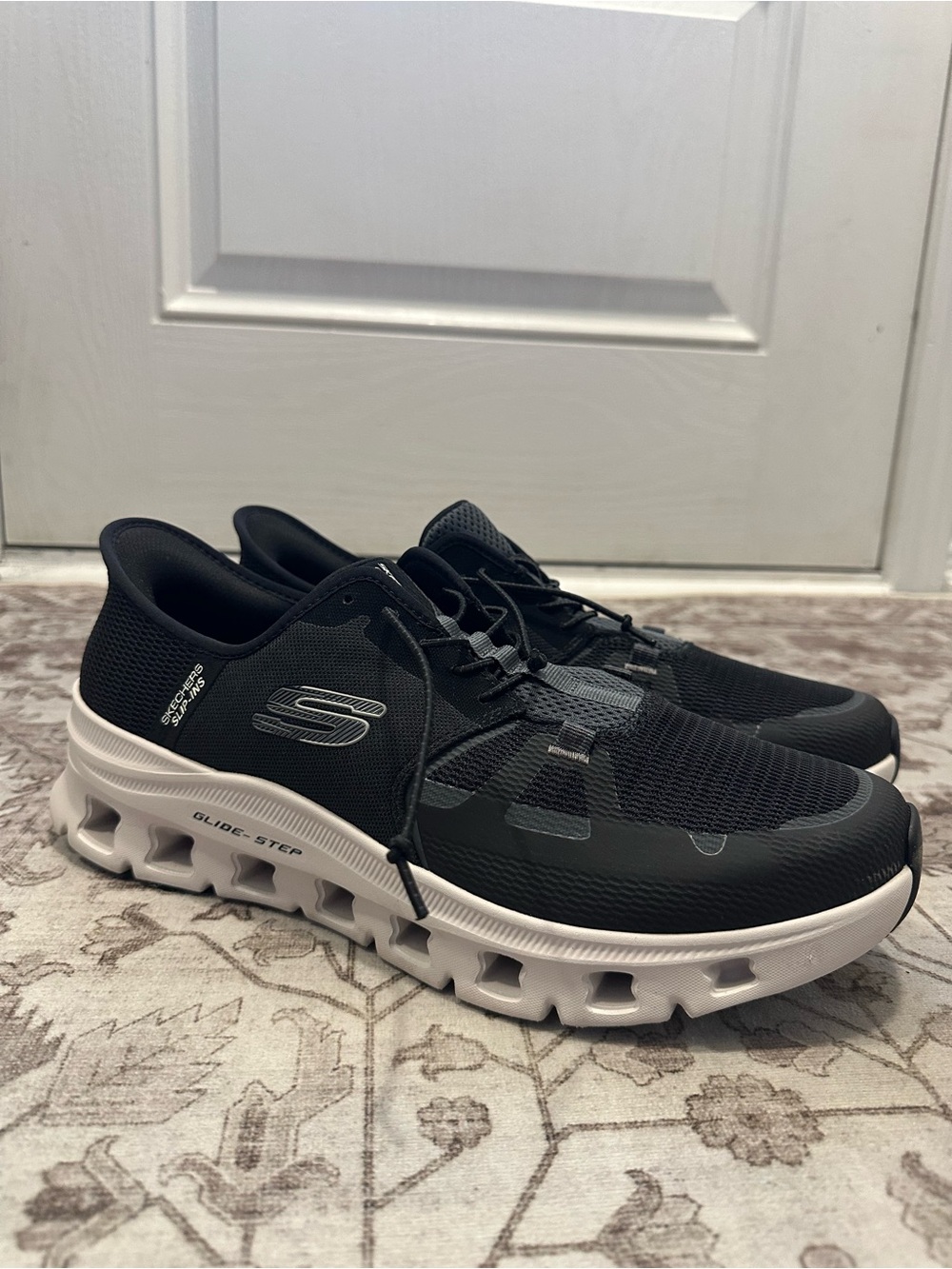 Skechers Men’s Black and White Glide-Step Athletic Sneakers